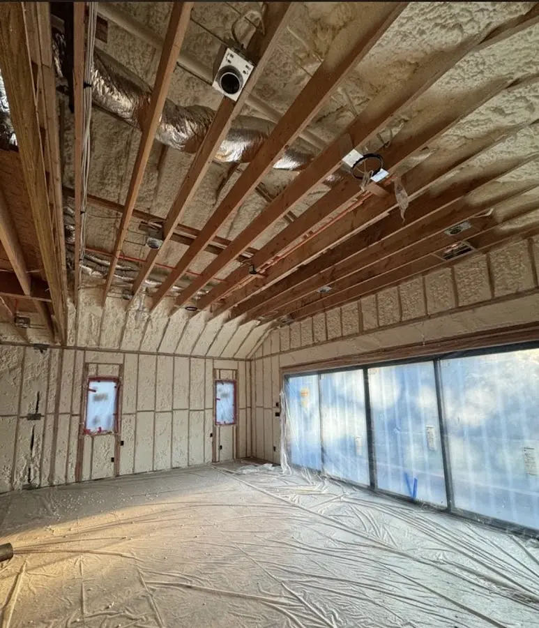 Interior walls and ceiling insulated with spray foam during new construction in Harahan